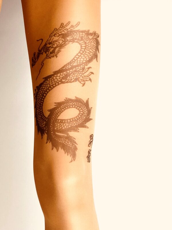 Women's nude tights printed with a "dragon" tattoo