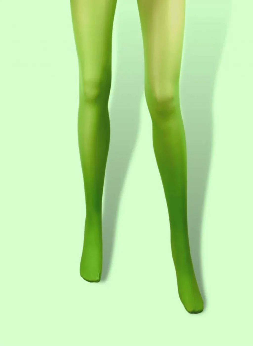 Pantimedias verde manzana en piernas de mujer sobre fondo verde claro | Apple green tights on woman's legs against light green background